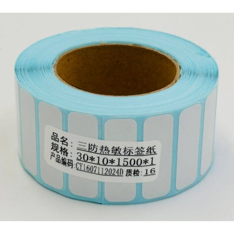 papier-ruban-thermique-30x10mm-vendu-par-1-rouleaux-de-1500-etiquettes-1.jpg Papier Ruban Thermique 30x10mm (Vendu par 1 Rouleaux de 1500 étiquettes) – Image 1